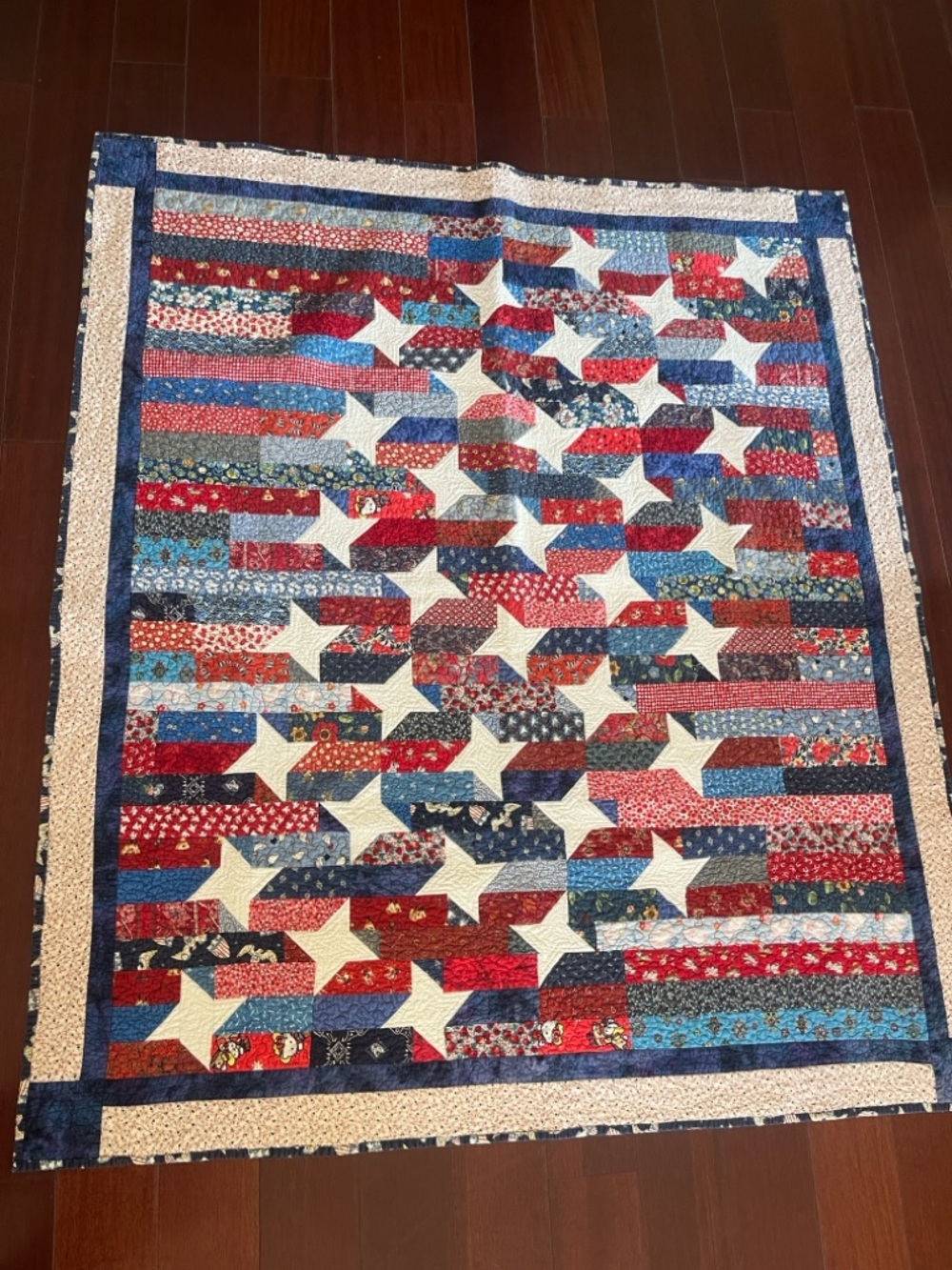 Patchwork Star Quilt in Red, White, and Blue